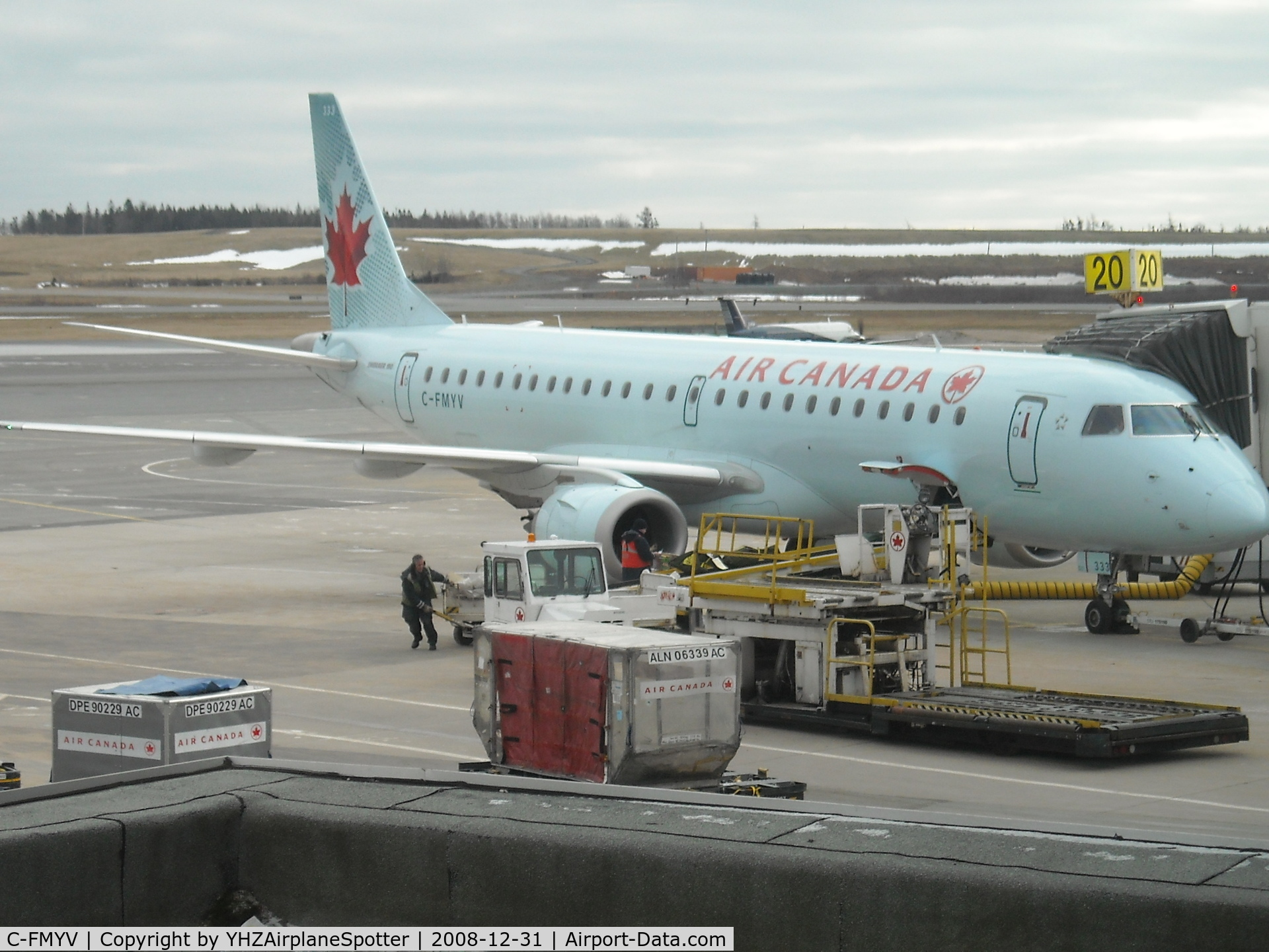 C-FMYV, 2007 Embraer 190AR (ERJ-190-100IGW) C/N 19000108, Sitting at Gate 20 at YHZ, with aircraft C-GKGA in the background