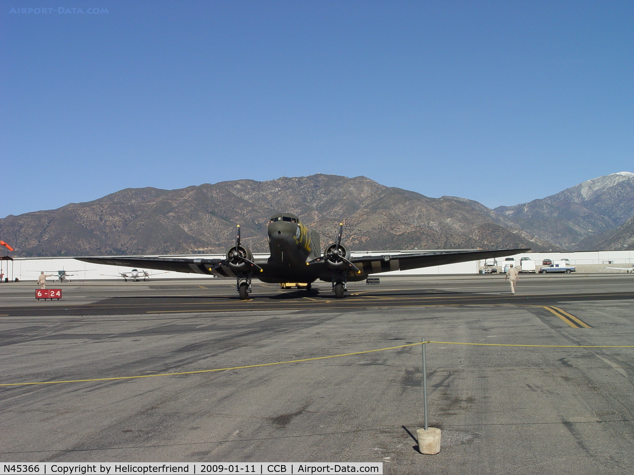 N45366, 1943 Douglas C-53D-DO Skytrooper (DC-3A) C/N 11757, Towed across runway, notice wing spotters