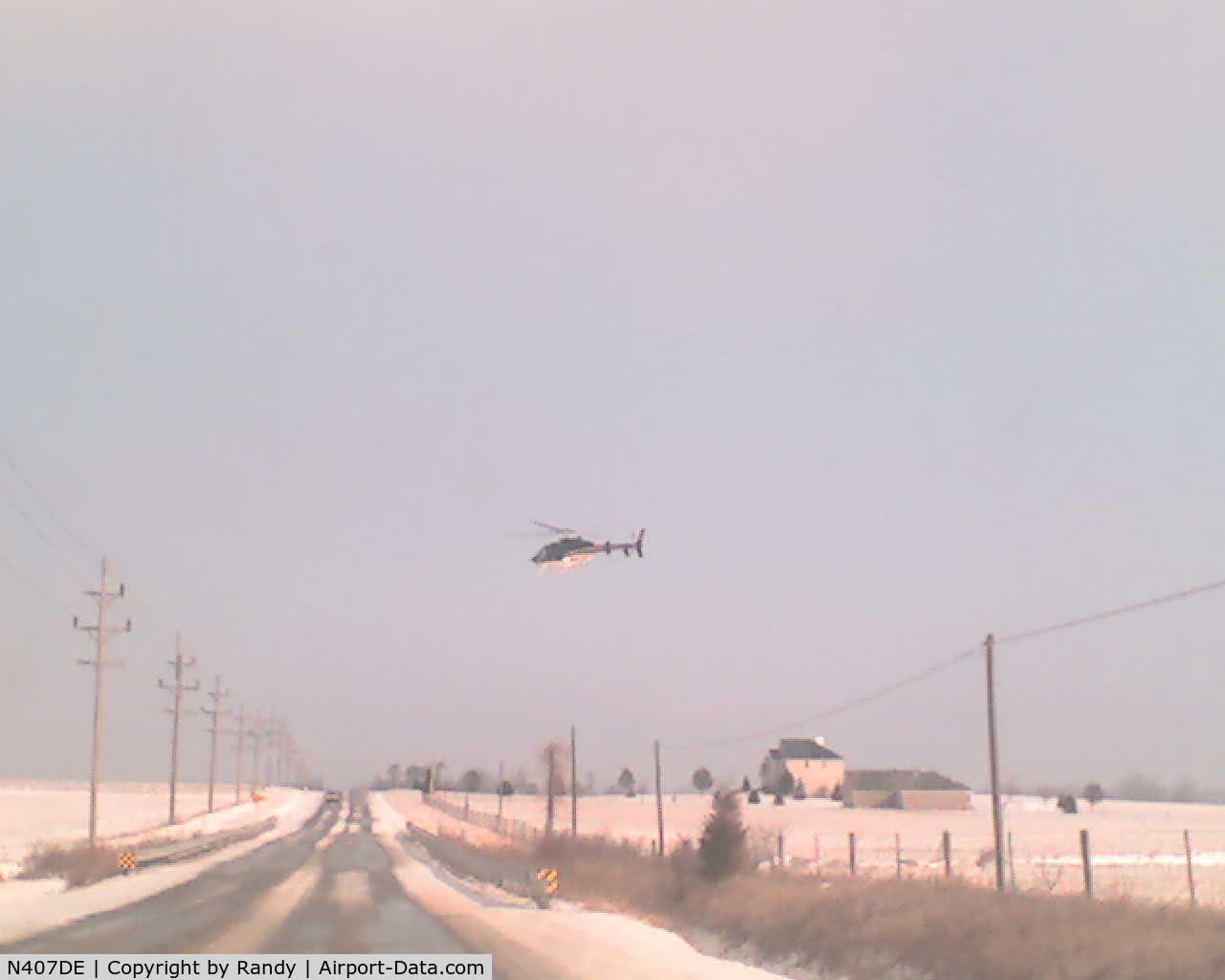 N407DE, Bell 407 C/N 53753, Checking power lines north of Jamestown, IN 1/18/09 (2)