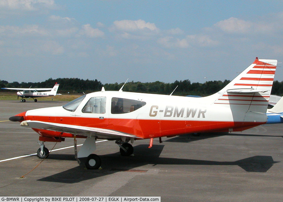 G-BMWR, 1975 Rockwell International 112 Commander C/N 365, RESIDENT COMMANDER 112 PARKED NEAR THE TERMINAL