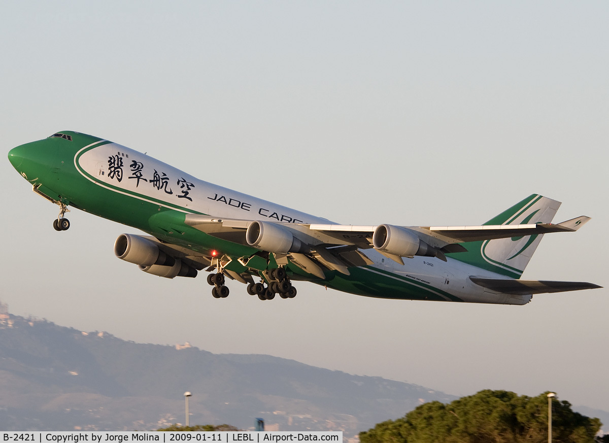 B-2421, 2007 Boeing 747-4EVF/ER/SCD C/N 35169, Taking off RWY 25L at dusk.