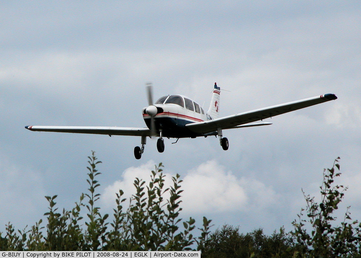 G-BIUY, 1981 Piper PA-28-181 Cherokee Archer II C/N 28-8190133, OVER THE TREES FOR RWY 25