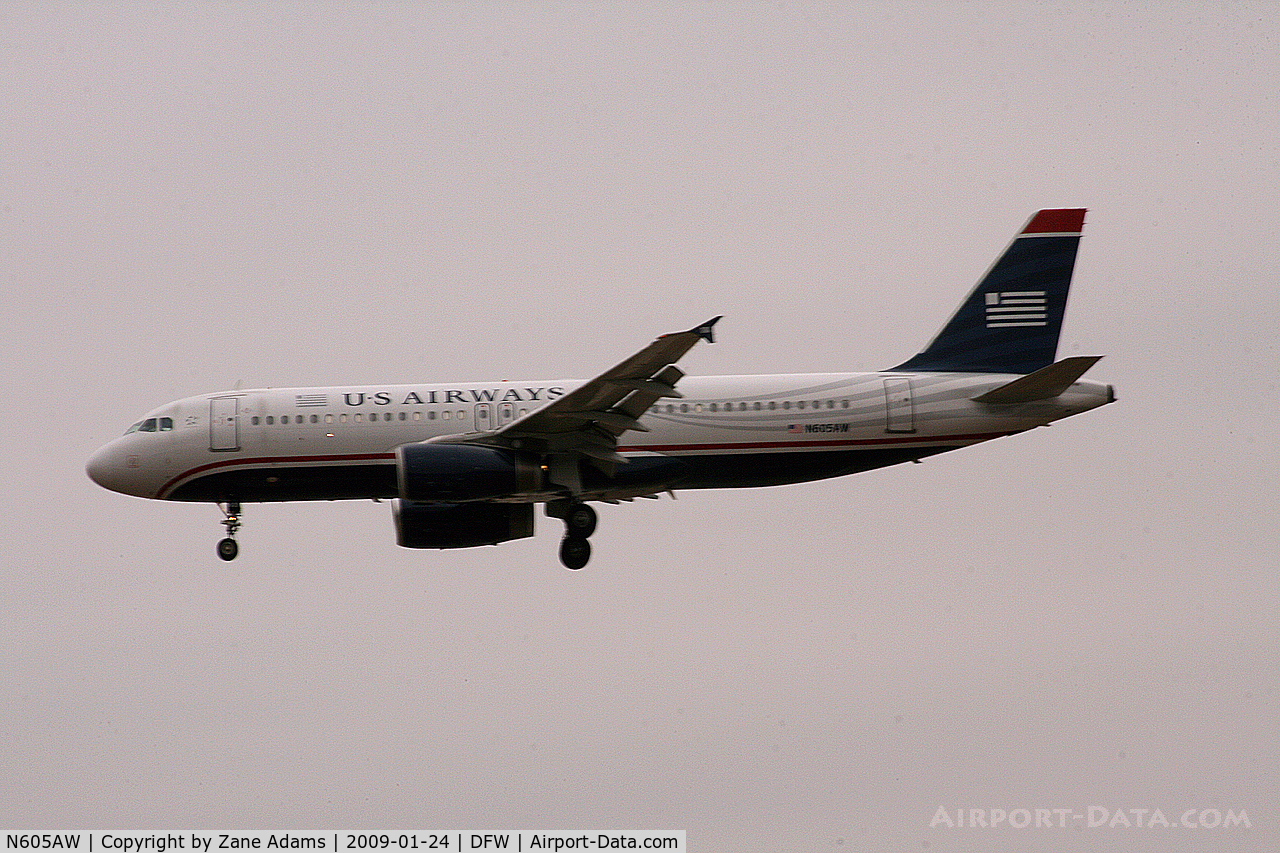 N605AW, 1997 Airbus A320-232 C/N 543, US Airways landing at DFW on a cold gray day.