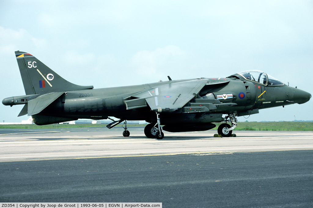 ZD354, 1988 British Aerospace Harrier GR.7 C/N P21, When the new generation Harrier was introduced 20[R] sqn was the first to operate this aircraft. Later this airframe was converted from Harrier GR.5 to Harrier GR.7, adding the distinctive bumps on the nose cone. Seen on the Brize Norton photo call.