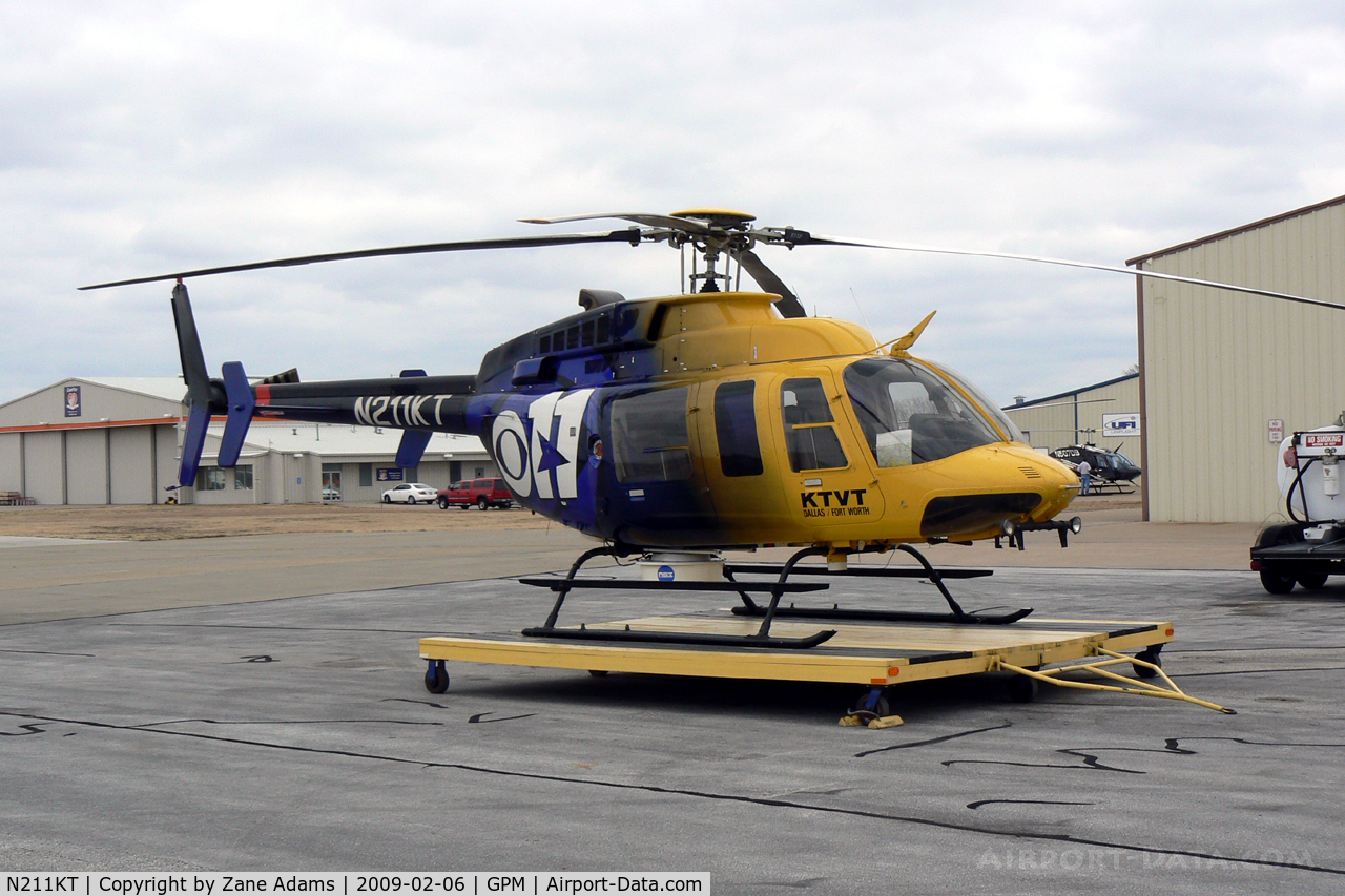 N211KT, 1997 Bell 407 C/N 53162, KTTV CBS Channel 11 DFW TV helicopter at Grand Prairie - The TV Station will no longer be using this aircraft. It is seen here without the camera on the nose and is just moments from departing under new ownership.