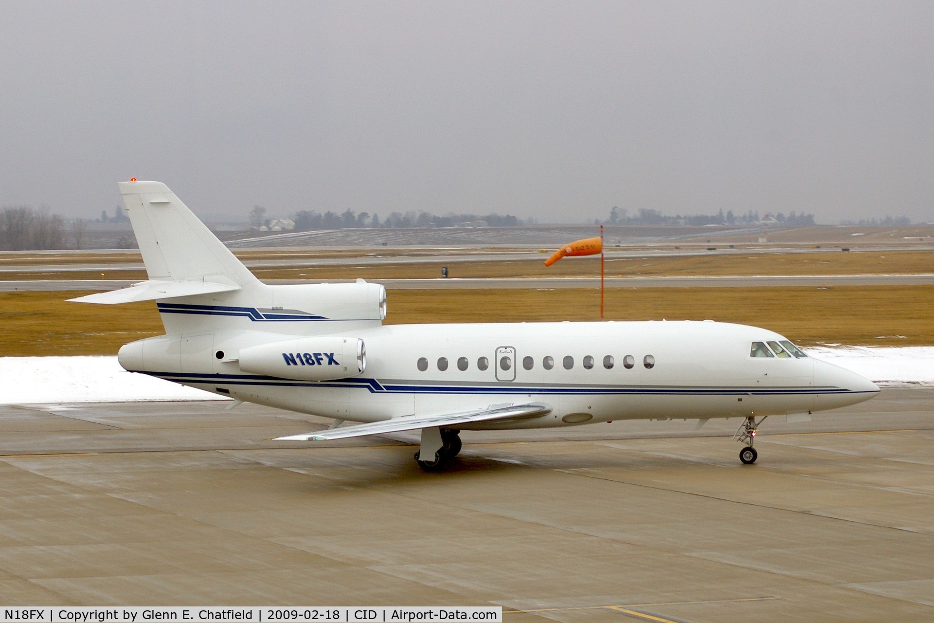 N18FX, 1995 Dassault Falcon 900 C/N 152, Taxiing by my window on the way to Landmark Aviation, drizzling