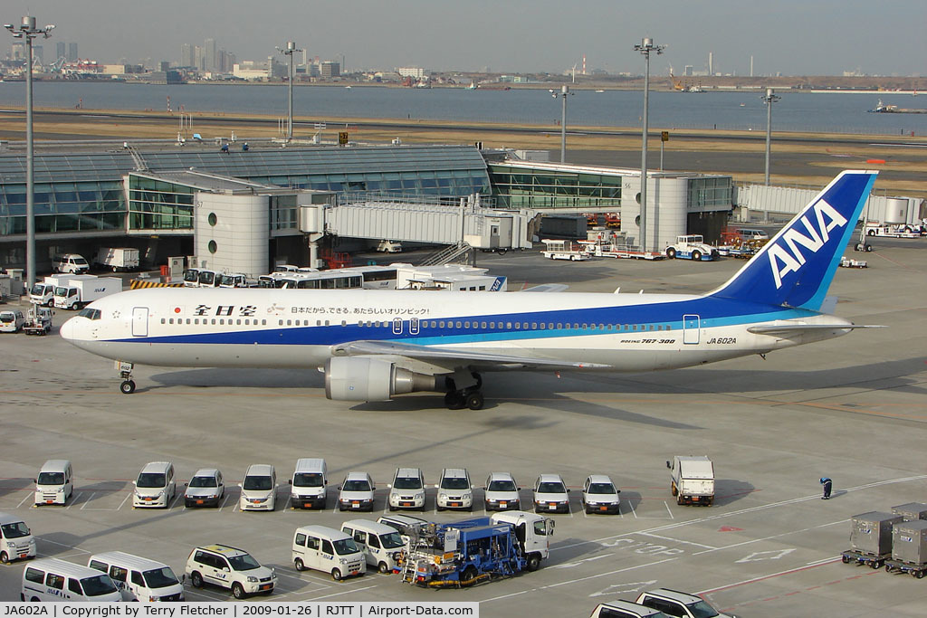 JA602A, 1997 Boeing 767-381 C/N 27944, ANA B767 taxies onto stand at Haneda