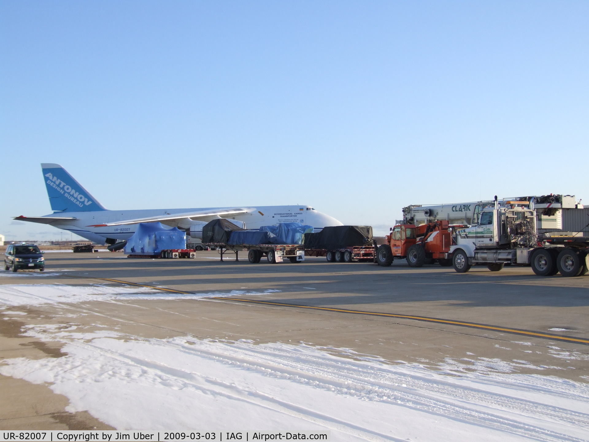 UR-82007, 1988 Antonov An-124-100 Ruslan C/N 19530501005, Part of the cargo to be loaded; Several more trucks pulled in as I was leaving