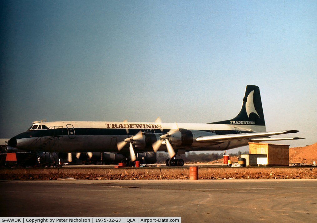 G-AWDK, 1961 Canadair CL-44D4-1 C/N 23, Tradewinds CL-44 undergoing maintenance at Lasham in 1975.