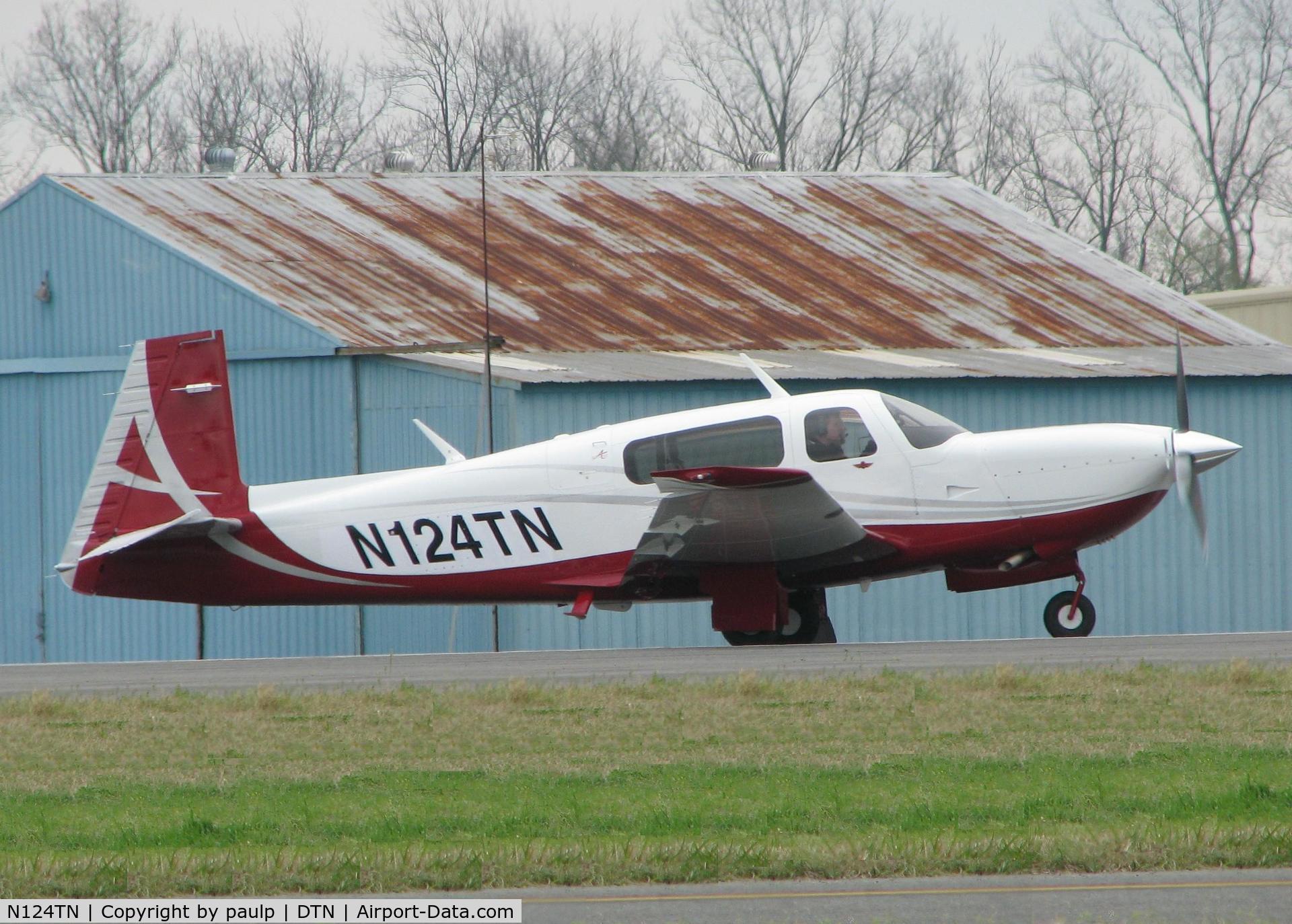 N124TN, Mooney M20TN Acclaim C/N 31-0124, Taking off from the Shreveport Downtown airport.