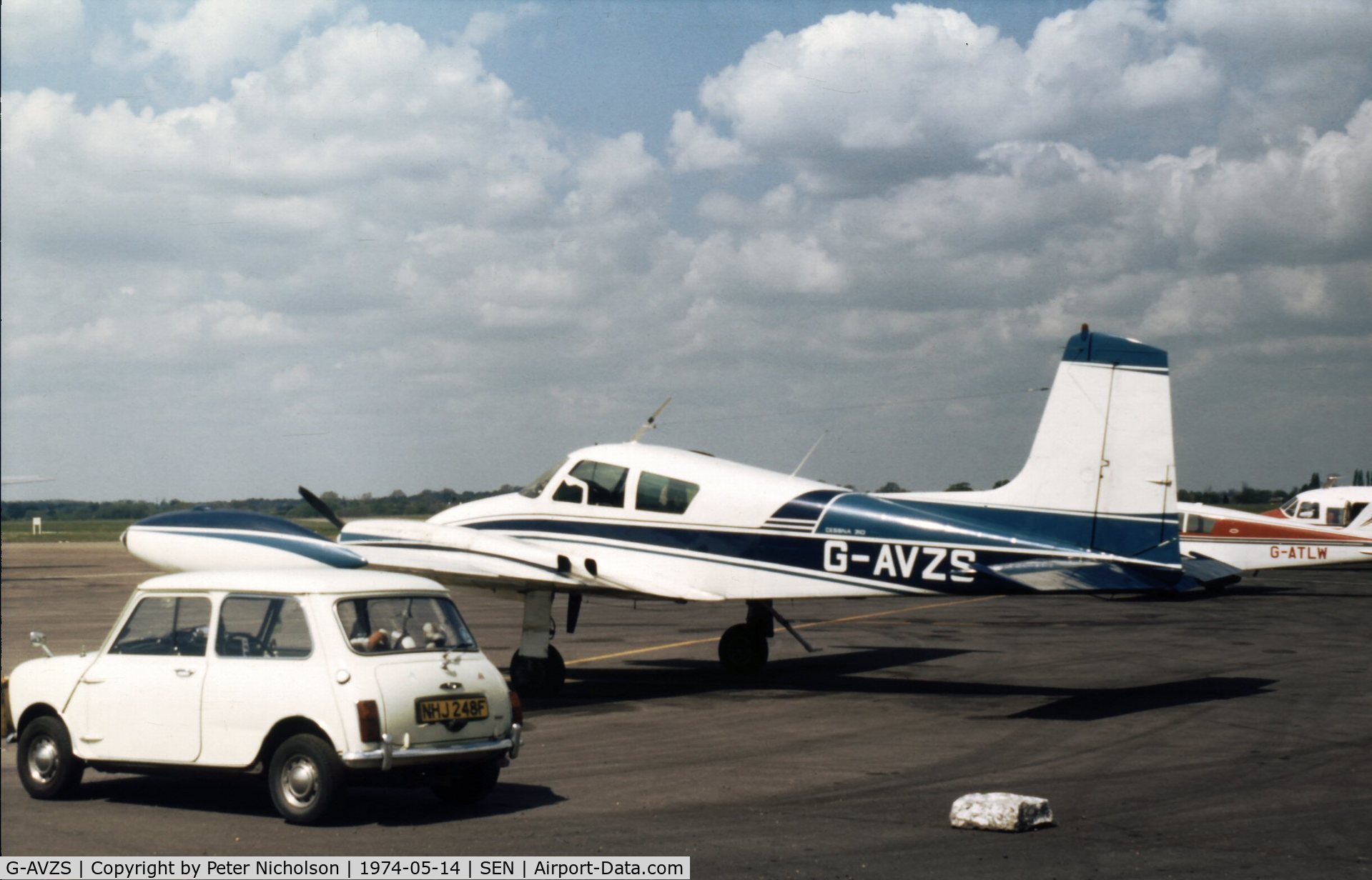 G-AVZS, 1958 Cessna 310B C/N 35660, Cessna 310B at Southend Airport alongside Morris Mini on the ramp.