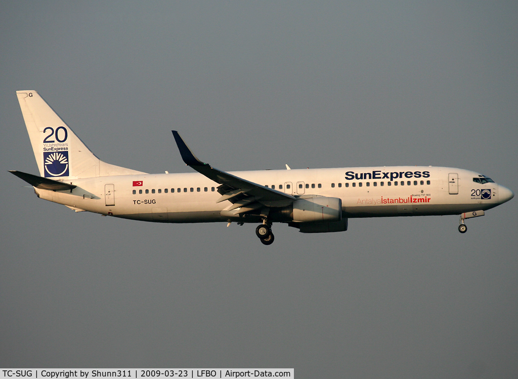 TC-SUG, 2002 Boeing 737-8CX C/N 32365, Landing rwy 32L with 20 years stickers :)