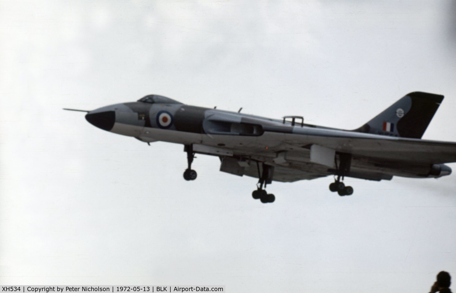 XH534, 1966 Avro Vulcan B.2 C/N Set 2, Vulcan B.2 of 230 Operational Conversion Unit landing at the Blackpool Airshow of 1972. Spectator visible at lower right corner gives some guide to the height of the Vulcan.