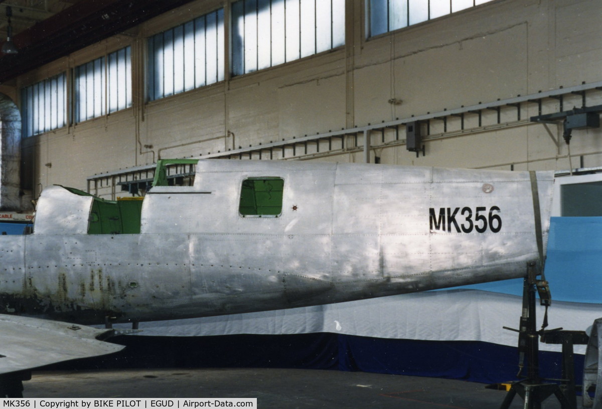 MK356, 1944 Supermarine 361 Spitfire LF.IXc C/N CBAF.IX.1561, MK356 AFTER STRIPING DOWN PRIOR TO REBUILD FOR BATTLE OF BRITAIN MEMORIAL FLIGHT.RAF ABINGDON EARLY 90'S
