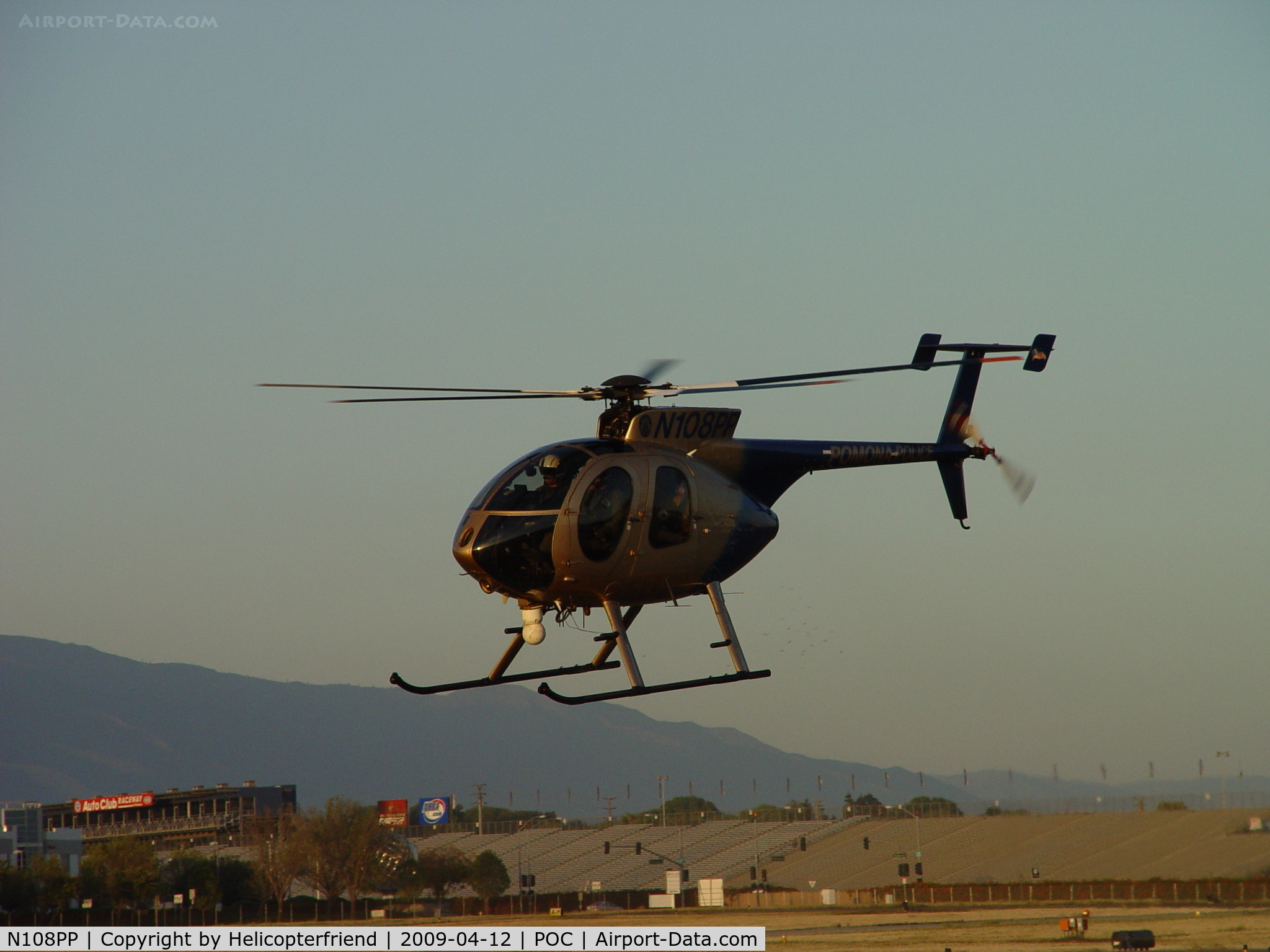 N108PP, 2008 MD Helicopters 369E C/N 0578E, Over south taxiway preparing to depart for patrol