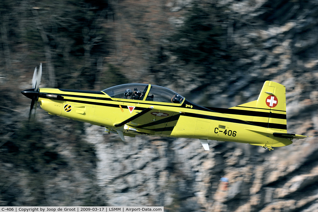 C-406, Pilatus PC-9 C/N 214, After take off this PC-9 remained very low over the runway. A spectaculair sight!