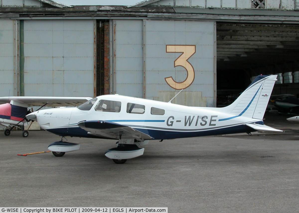 G-WISE, 2007 Piper PA-28-181 Cherokee Archer III C/N 28-43658, SIERRA ECHO PARKED IN FRONT OF ONE OF THE FIRST WORLD WAR BELFAST HANGERS