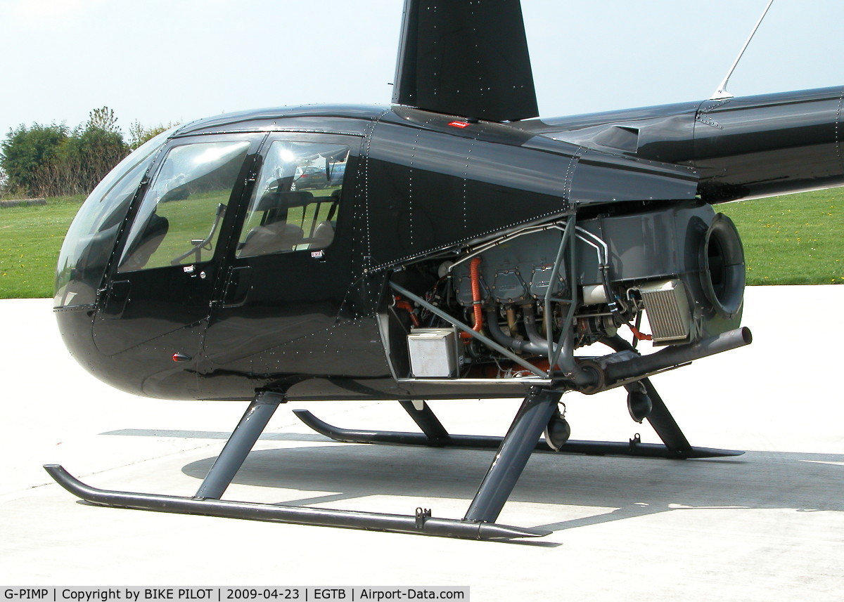 G-PIMP, 2008 Robinson R44 Raven II C/N 12123, MIKE PAPA ON THE HELI AIR APRON WITH THE ENGINE COWLINGS OF