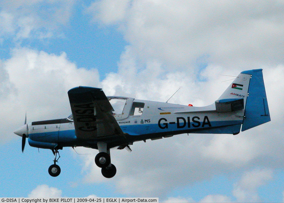 G-DISA, 1983 Scottish Aviation Bulldog Series 120 Model 125 C/N BH120/435, BRITISH DISABLED FLYING ASSN. BULLDOG DOING A TOUCH AND GO