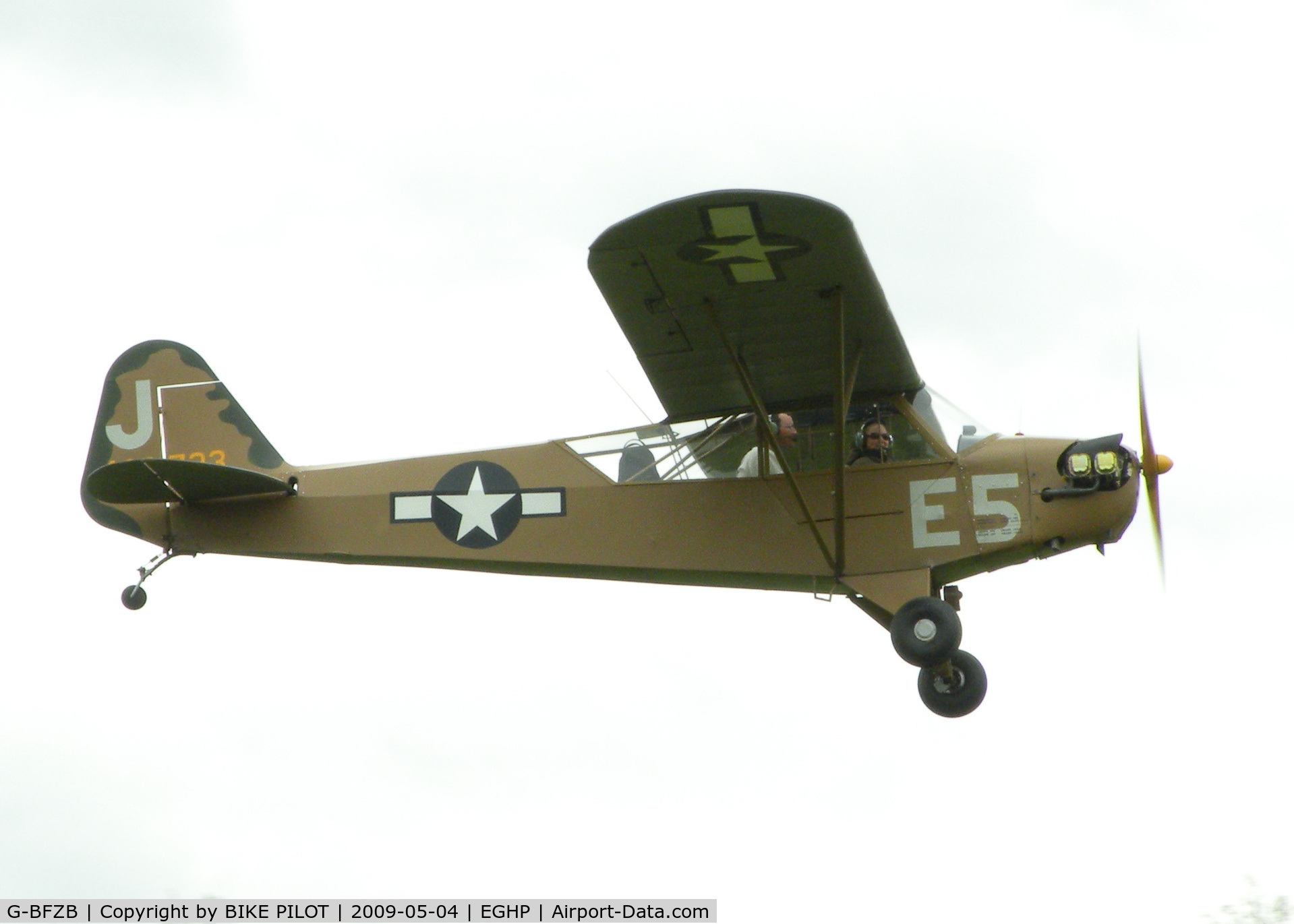 G-BFZB, 1947 Piper L-4J Grasshopper (J3C-65D) C/N 13019, WELL TURNED OUT CUB CLIMBING AWAY FROM RWY 26