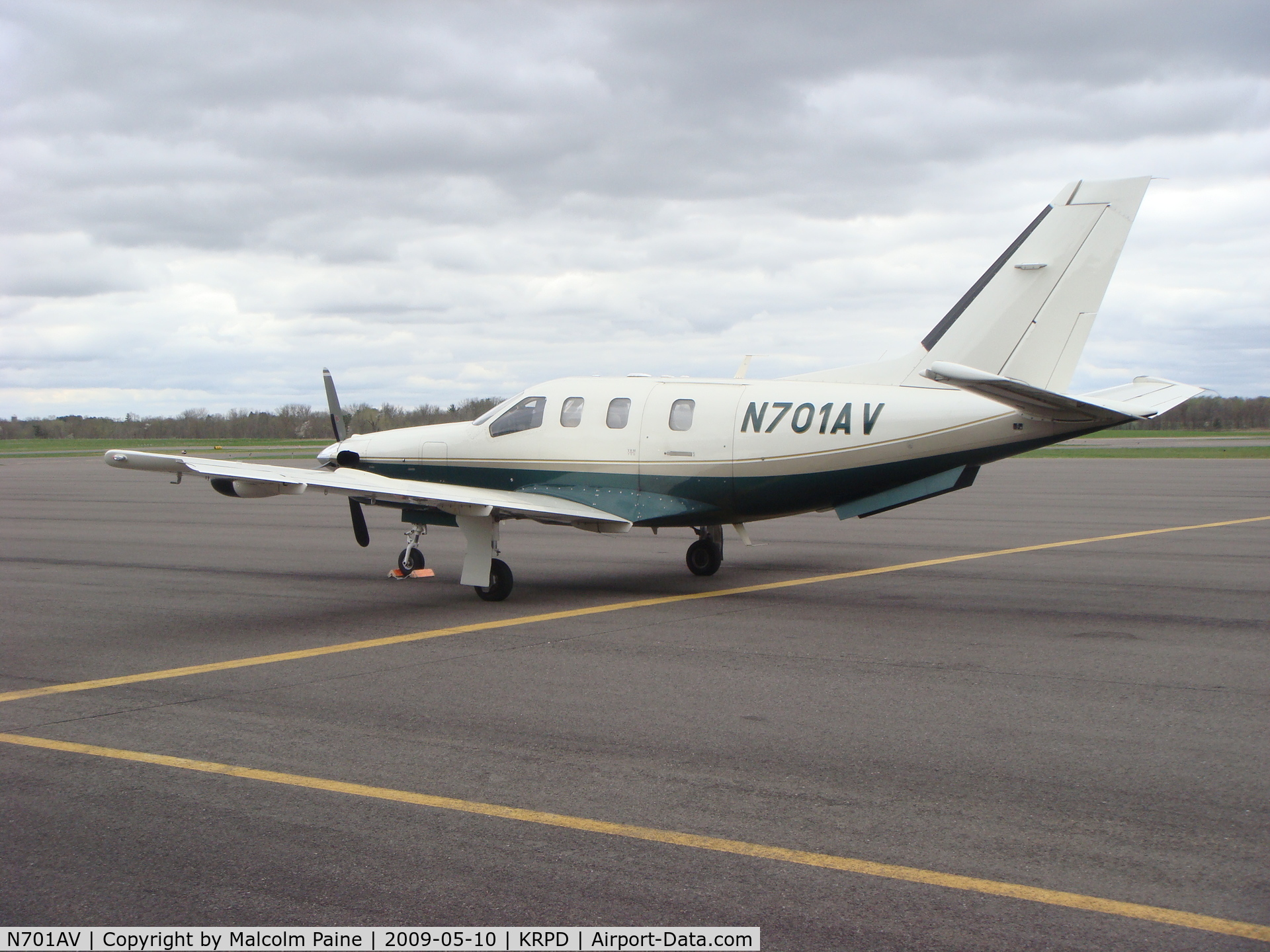 N701AV, 2000 Socata TBM-700 C/N 179, Parked in front of terminal at Rice Lake Regional Airport