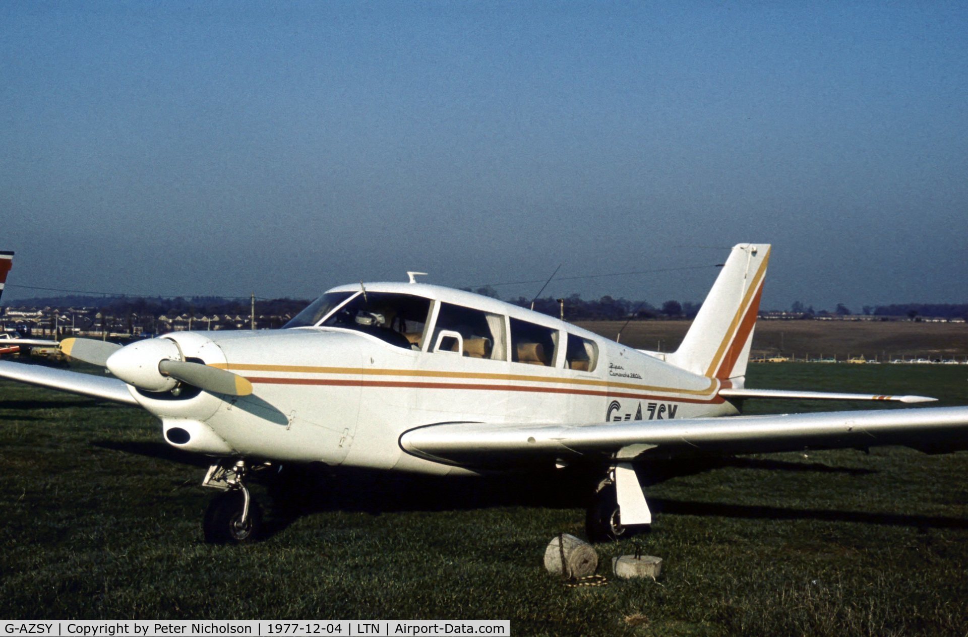 G-AZSY, 1966 Piper PA-24-260 Comanche B C/N 24-4438, This Comanche was seen at Luton in December 1977.