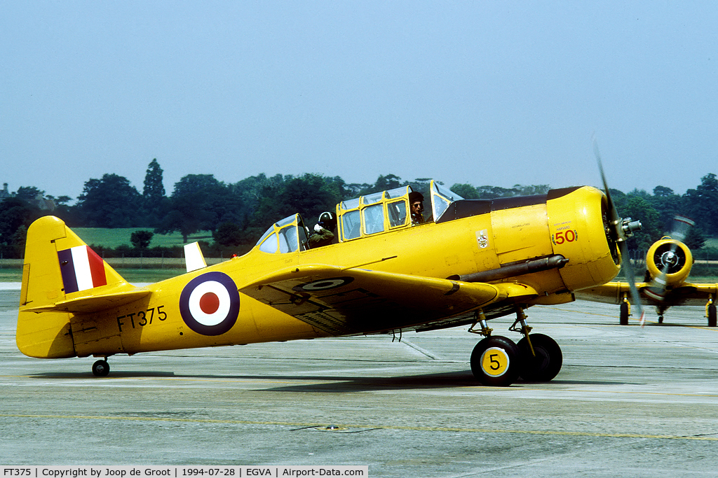 FT375, 1943 Noorduyn AT-16 Harvard IIB C/N 14A-1415, During the nineties the RAF still operated some Harvards. Here FT375 and KF183 arrive for the 1994 IAT, both sporting 50 years Harvard markings.