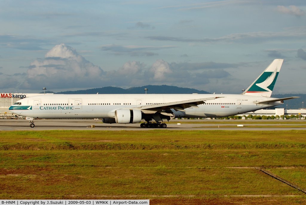 B-HNM, 2003 Boeing 777-367 C/N 33702, From HKG