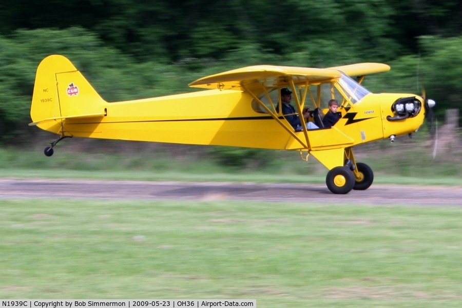 N1939C, Piper J3C-65 Cub Cub C/N 4731, Landing on 3 at Zanesville Riverside with a wide-eyed Young Eagle passenger.