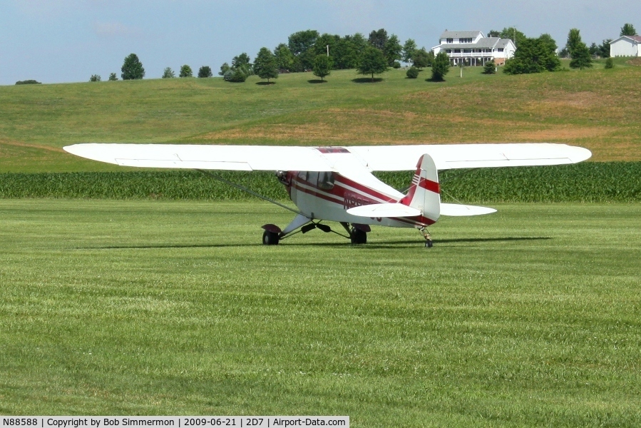 N88588, 1946 Piper J3C-65 Cub Cub C/N 16214, Departing 28 at the Beach City, Ohio Father's Day fly-in.