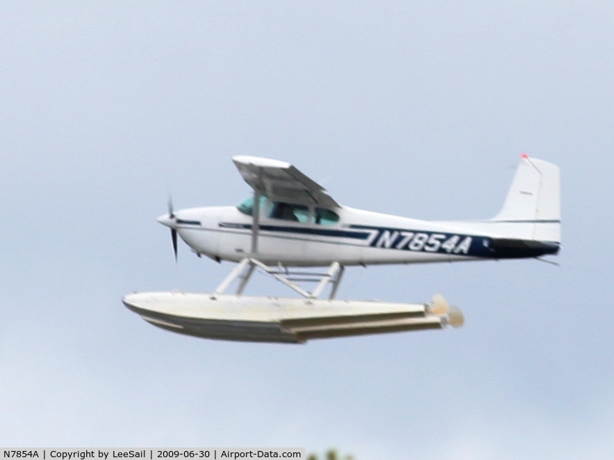 N7854A, 1956 Cessna 180A C/N 32751, Taking off to the West out of Forest Lake, MN