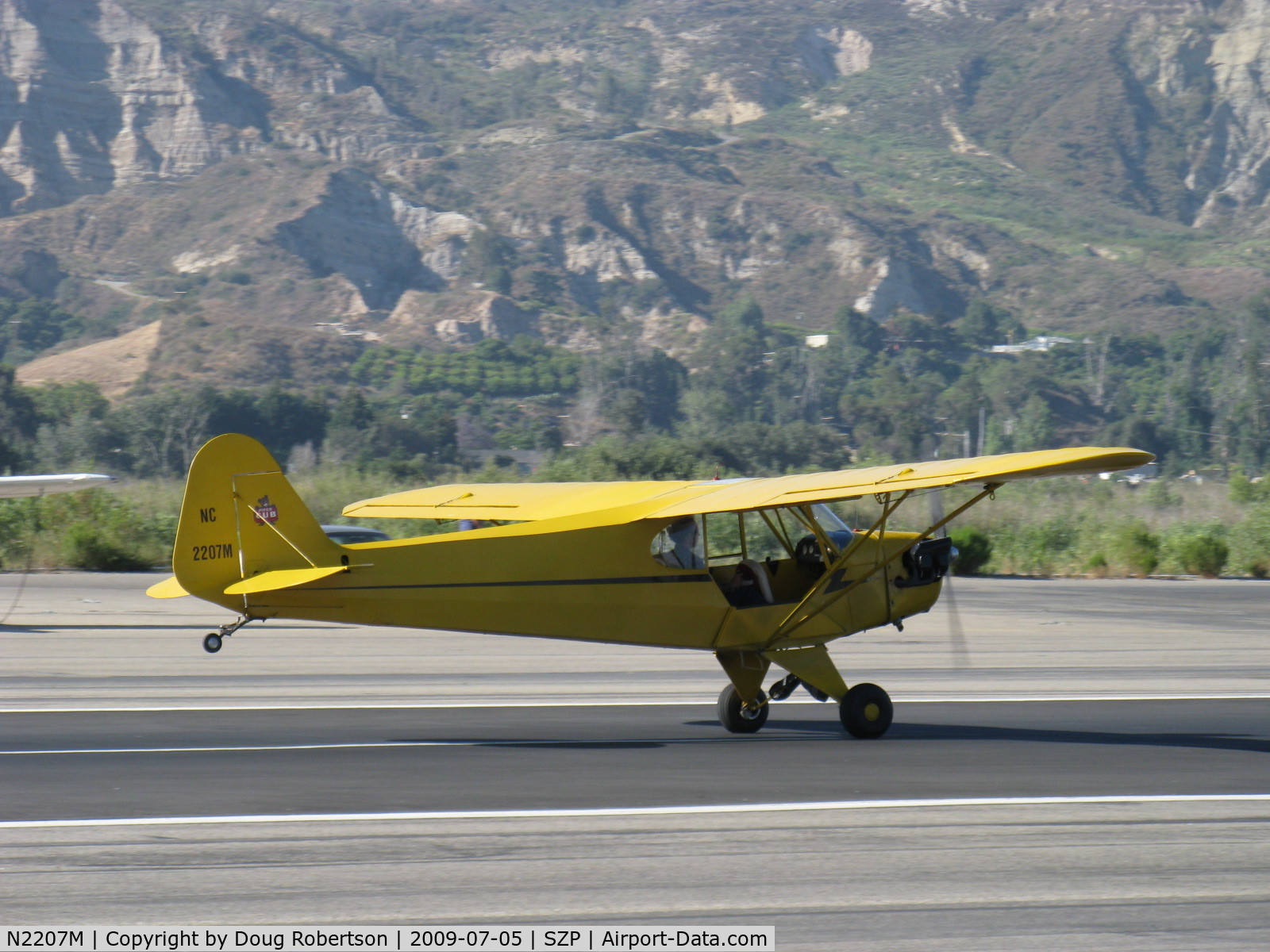 N2207M, 1946 Piper J3C-65 Cub Cub C/N 20995, 1946 Piper J3C-65 CUB, Continental A&C65 65 Hp, landing roll Rwy 22