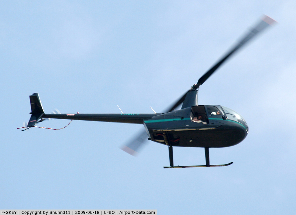 F-GKEY, Robinson R44 Raven II C/N 11289, Passing over the airport...