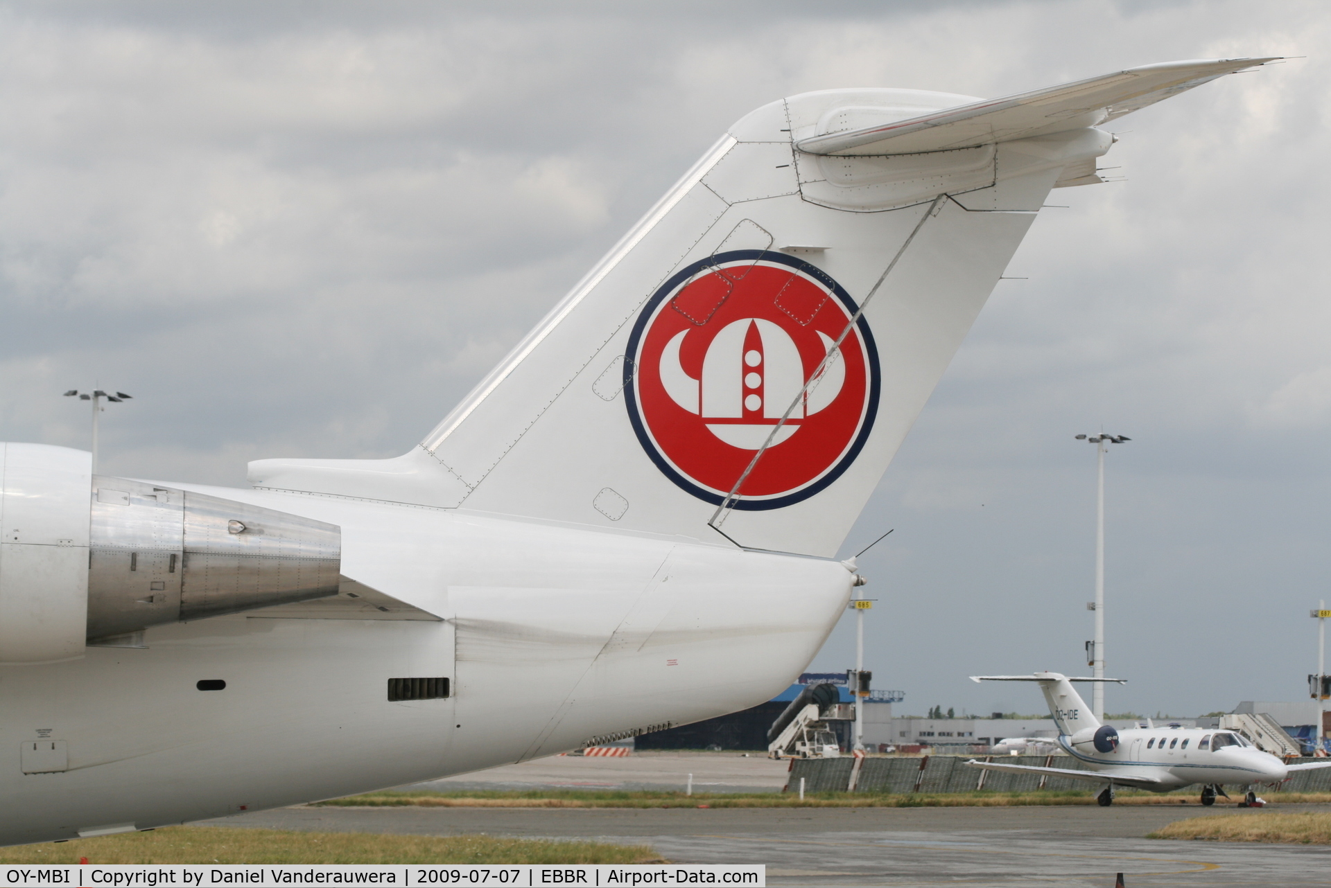 OY-MBI, 2000 Canadair CRJ-200LR (CL-600-2B19) C/N 7436, parked on General Aviation apron (Abelag)