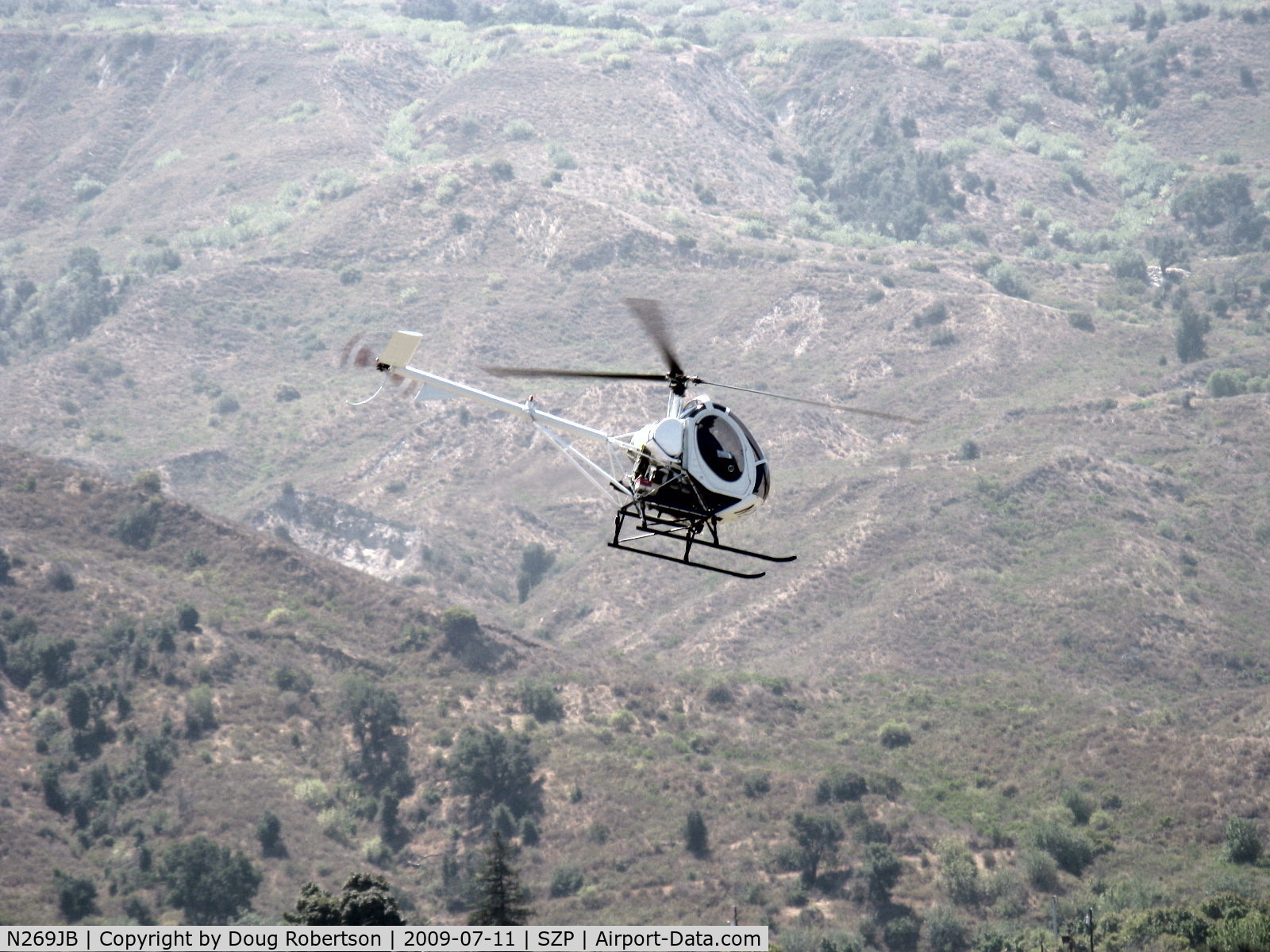 N269JB, Hughes 269A C/N 105-0395, Hughes 269A Helicopter, Lycoming HIO-360-B1A 180 Hp, departing SZP helipad