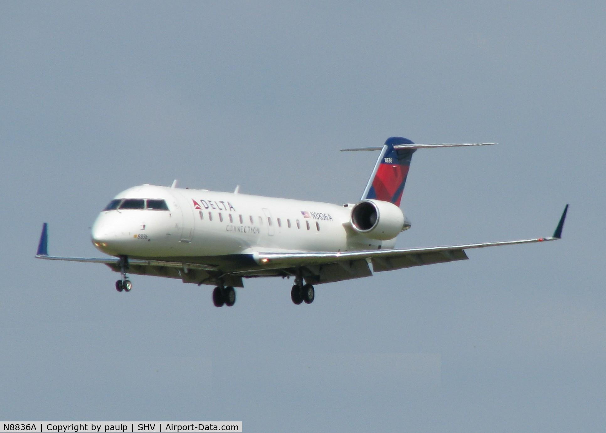 N8836A, 2003 Bombardier CRJ-200 (CL-600-2B19) C/N 7836, Landing on 14 at Shreveport Regional.