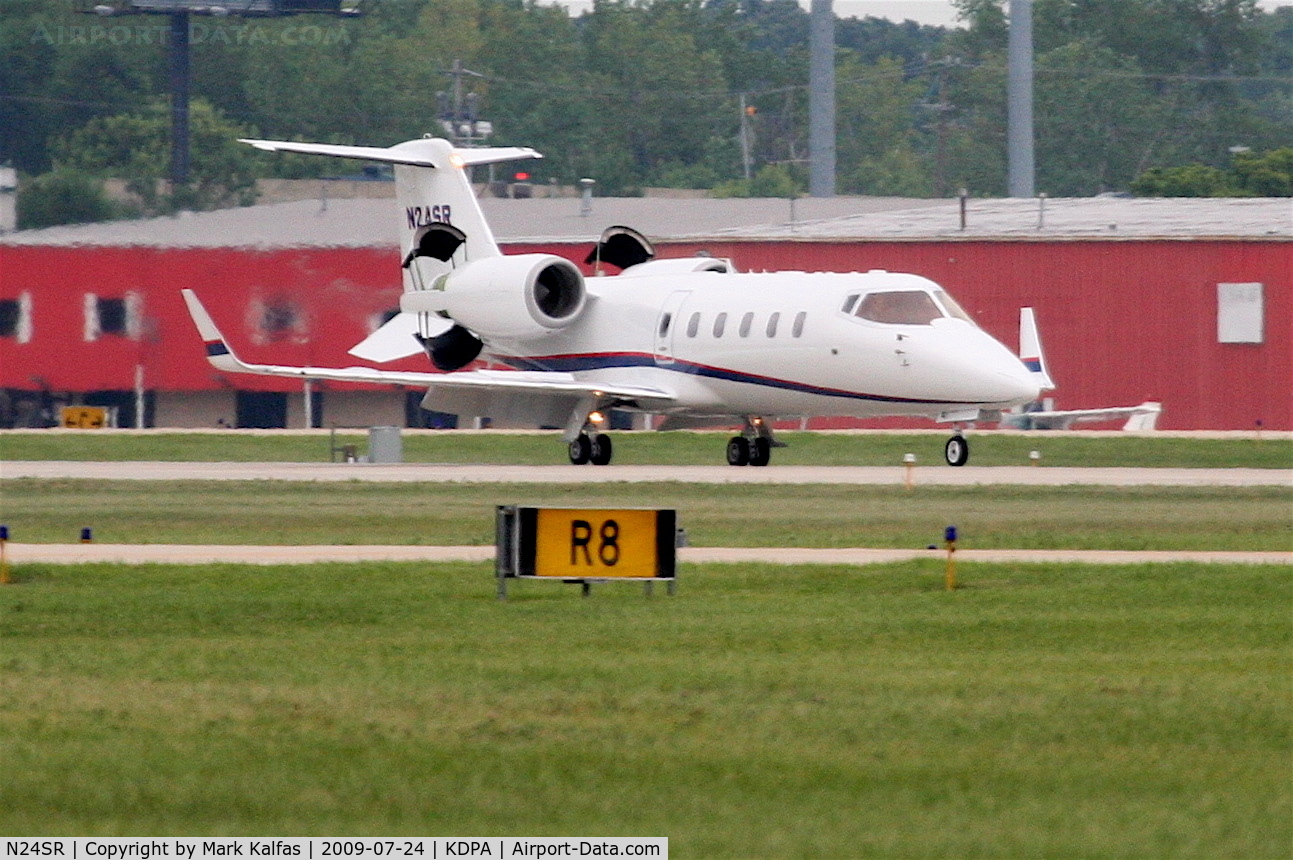 N24SR, 2001 Learjet 60 C/N 234, Sears Roebuck Learjet 60, deploying reversers, arriving 20R KDPA after a trip from KAVL
