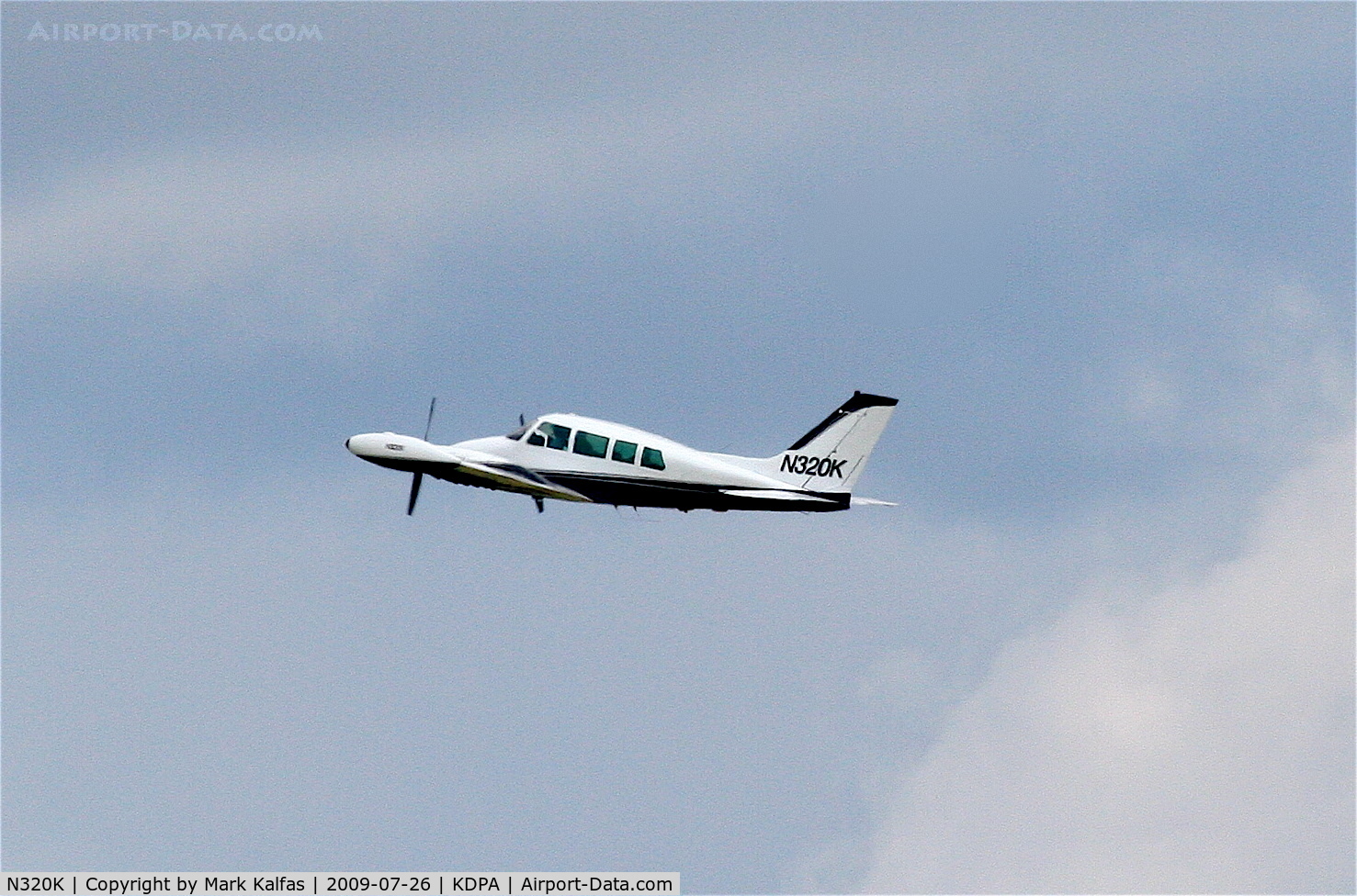 N320K, 1961 Cessna 320 Skyknight C/N 320-0018, Cessna 320 N320K, departing RWY 2R KDPA.