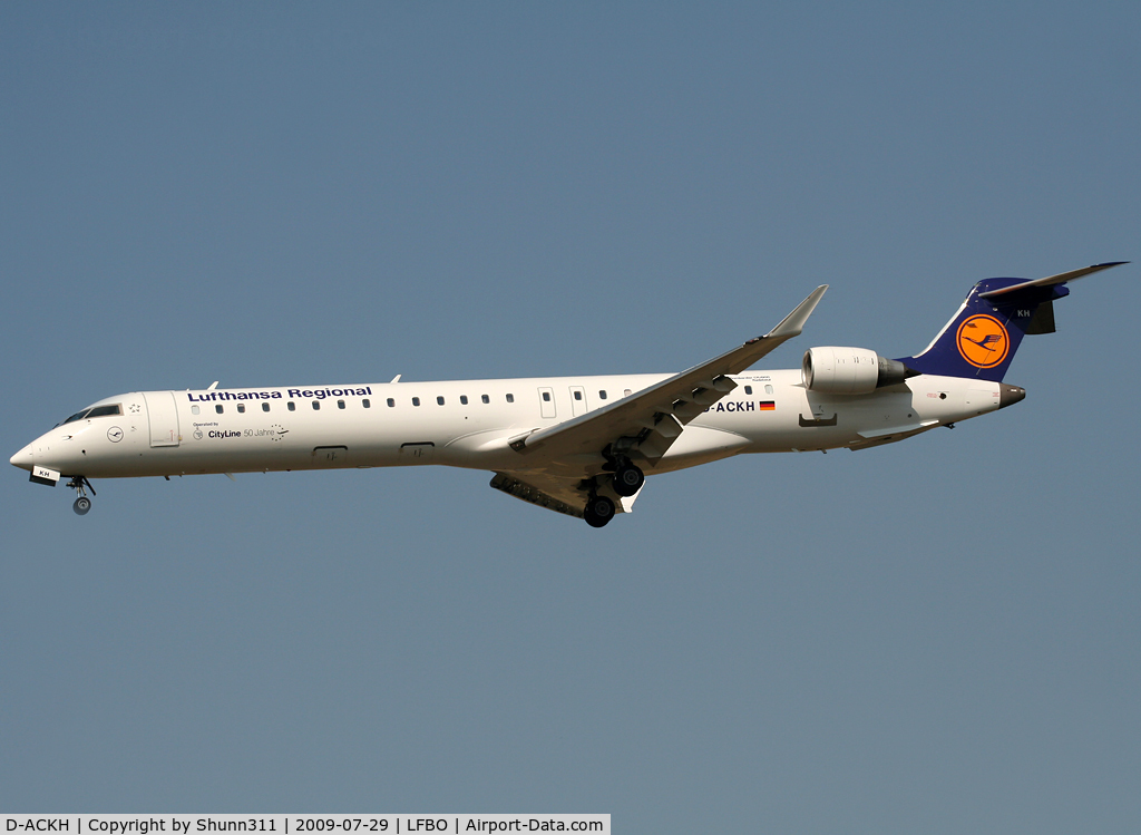 D-ACKH, 2006 Bombardier CRJ-900LR (CL-600-2D24) C/N 15085, Landing rwy 32L with additional '50 Jahre' sticker...