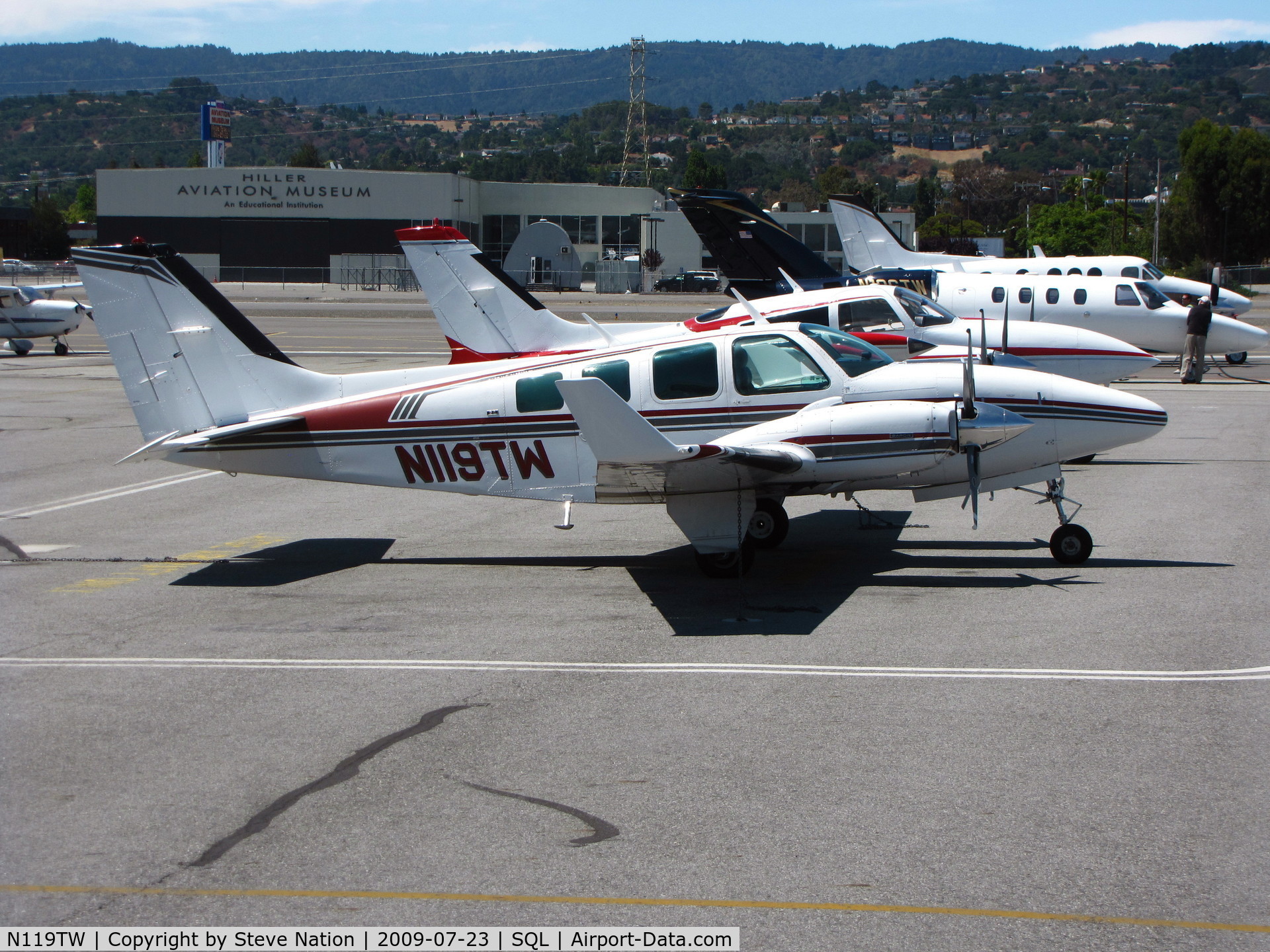 N119TW, 1974 Beech 58 Baron C/N TH-533, 1974 Beech 58 Baron with winglets from KSAC on transient ramp @ San Carlos Muni, CA