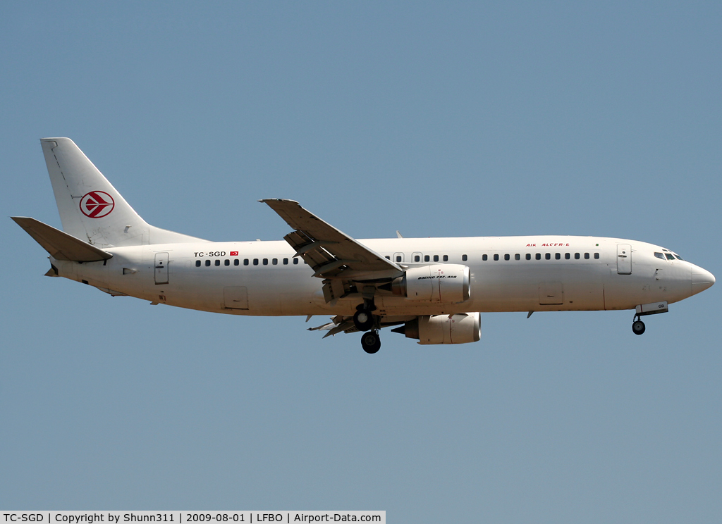 TC-SGD, 1997 Boeing 737-48E C/N 25773, Landing rwy 14R with Air Algerie titles and logos...