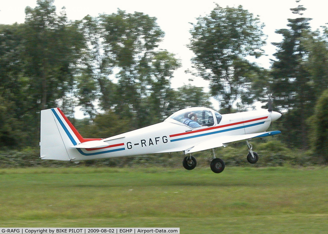 G-RAFG, 1989 Slingsby T-67C Firefly C/N 2076, JUST LEAVING RWY 26