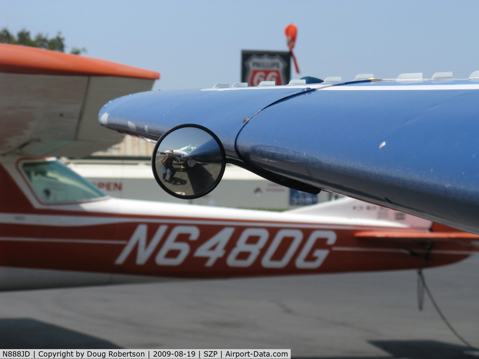 N888JD, 1968 Beech E95 C/N TD-720, 1968 Beech E95 TRAVEL AIR, two Lycoming IO-360s 180 Hp each, convex mirror shows retractible gear position (and photographer)