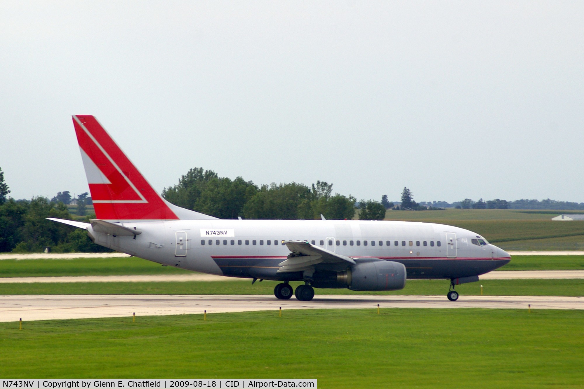 N743NV, 2000 Boeing 737-6Z9 C/N 30137, Doing touch and goes on Ry 31.  Seen from my window.