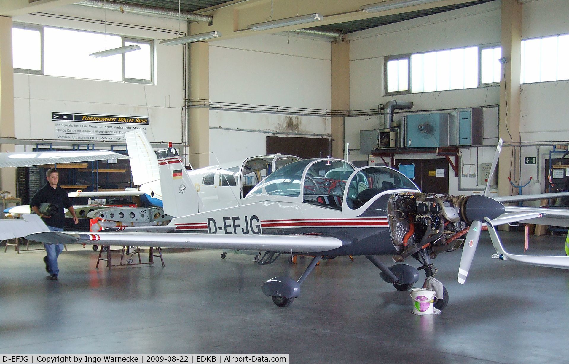 D-EFJG, 1971 Bolkow BO-209 Monsun 160RV C/N 129, Bölkow Bo 209 Monsun in a maintenance hangar during the Bonn-Hangelar centennial jubilee airshow