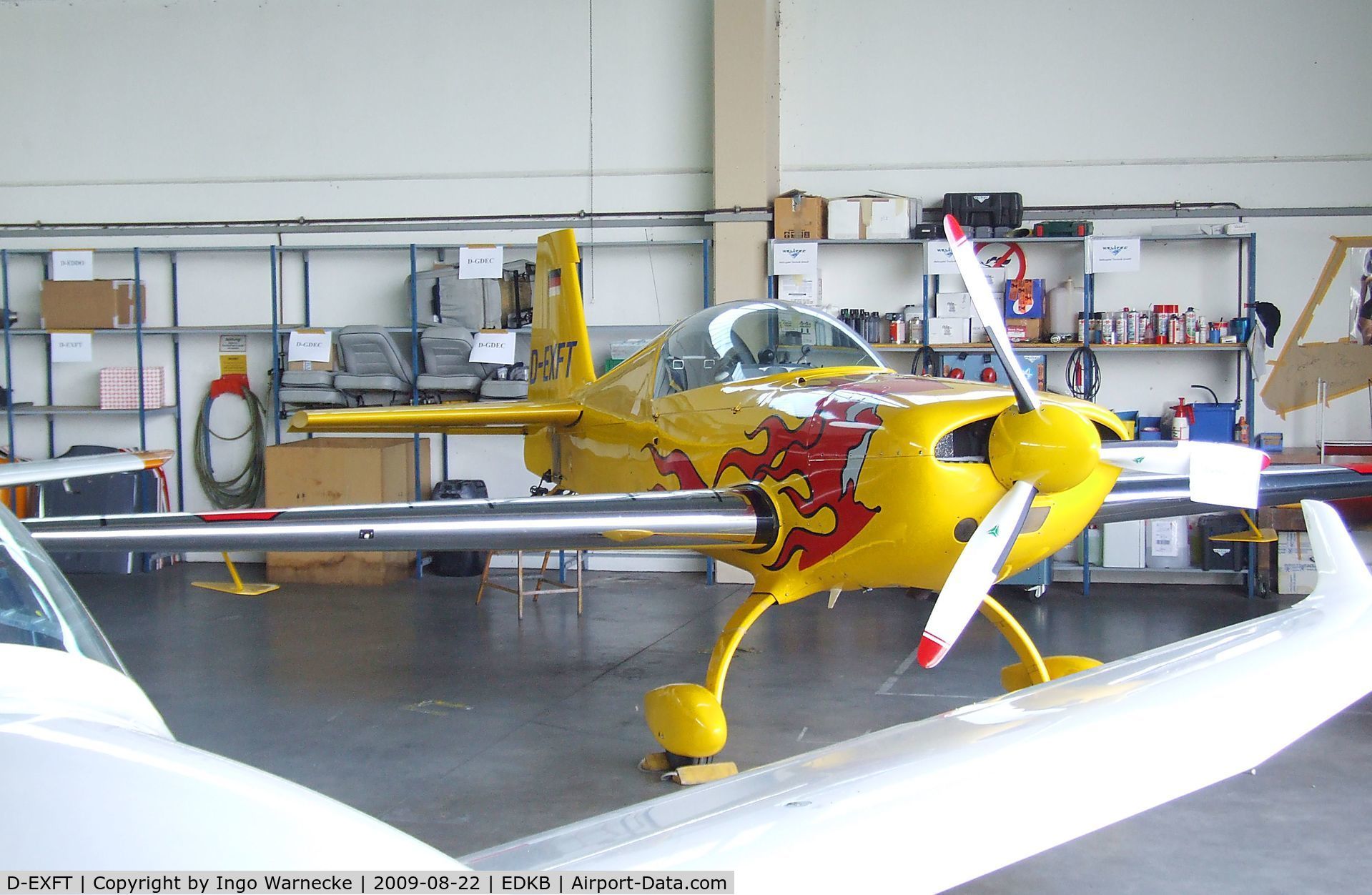 D-EXFT, Extra EA-200 C/N 025, Extra EA-200 in a maintenance hangar during the Bonn-Hangelar centennial jubilee airshow