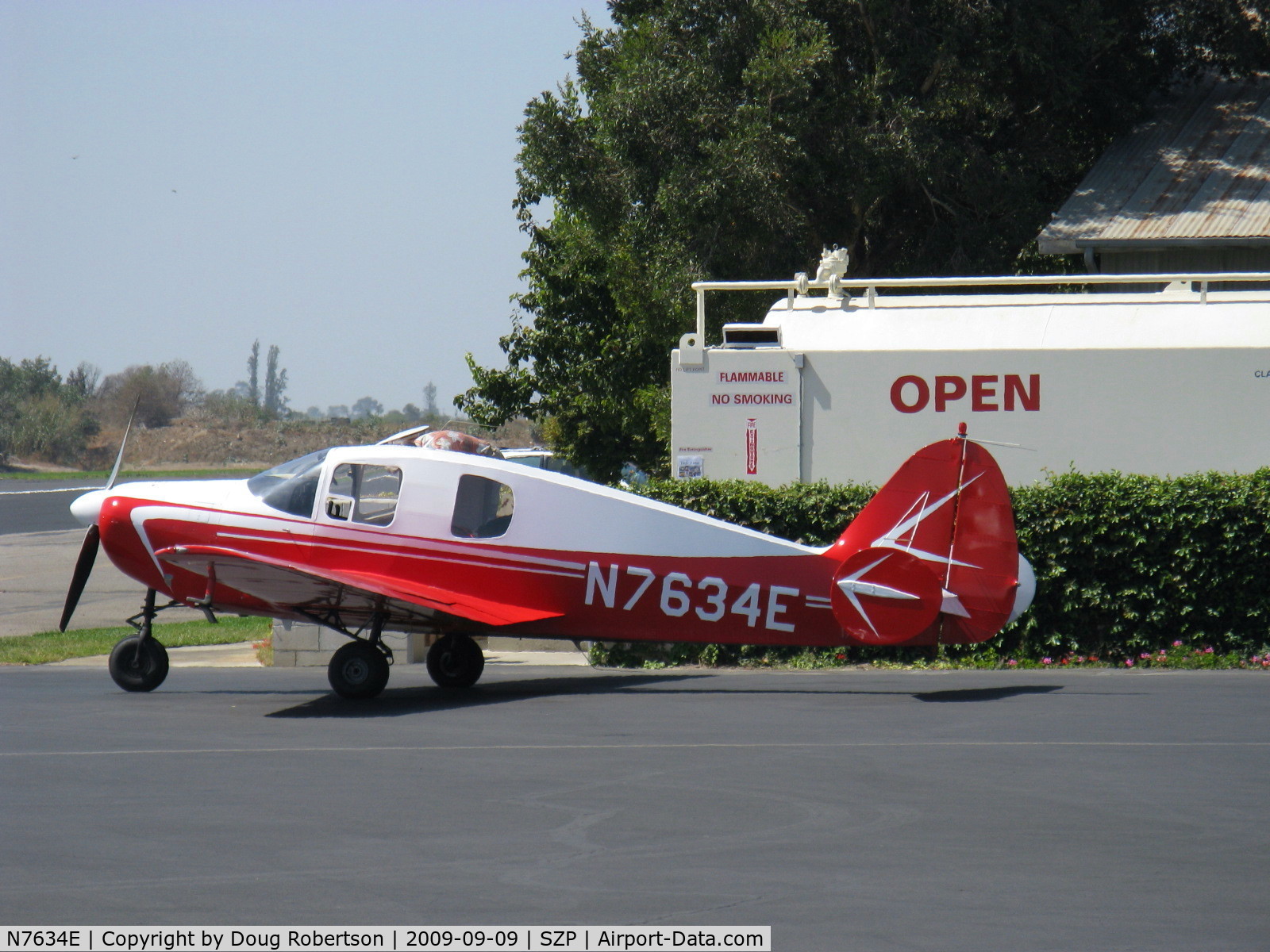 N7634E, 1959 Downer Bellanca 14-19-3 C/N 4136, 1959 Downer Bellanca 260 14-19-3 Cruisemaster, Continental O-470-F 260 Hp, refueling, last of the triple-tail Bellancas model-the 260A went to single tail.