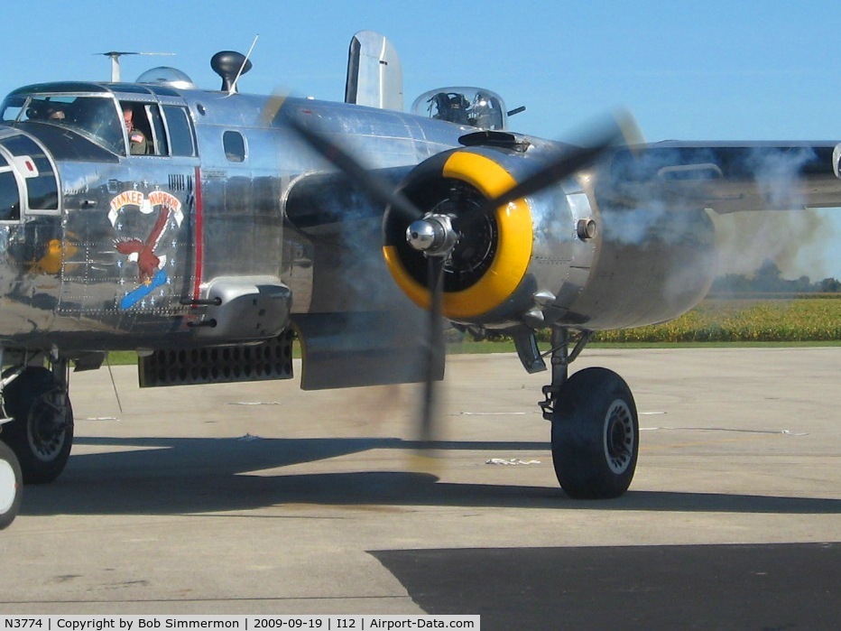 N3774, 1943 North American B-25D Mitchell C/N 100-23960, No. 1 meshed on the ramp at Sidney, Ohio during the EAA fly-in.