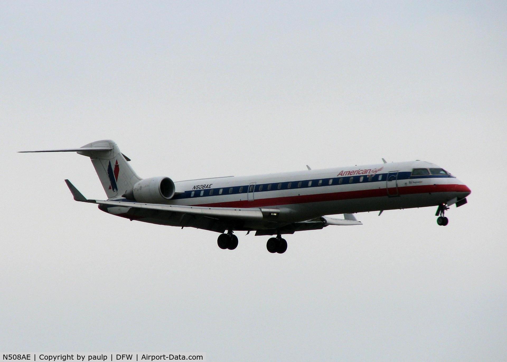 N508AE, 2002 Bombardier CRJ-701ER (CL-600-2C10) Regional Jet C/N 10072, Landing on 18R at DFW. A rainy day!