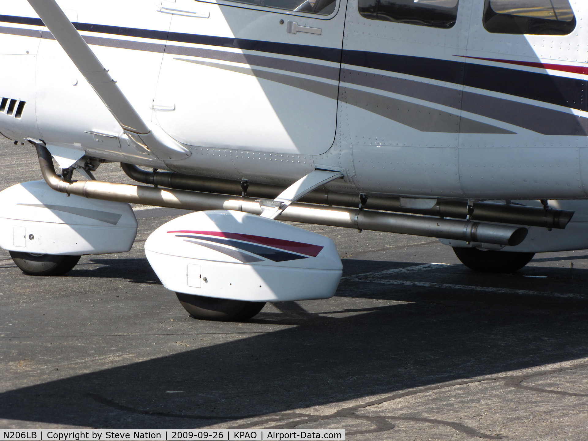 N206LB, 1999 Cessna 206H Stationair C/N 20608055, Cessna 206H (close-up extended exhaust pipe)